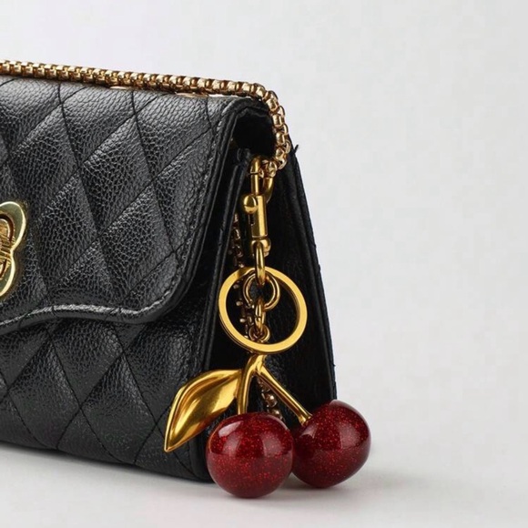 None Accessories - Elegant Gold and Red Cherry Keychain